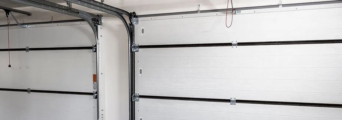 Fix Folding Garage Door Jerking in Palm Bay, Florida