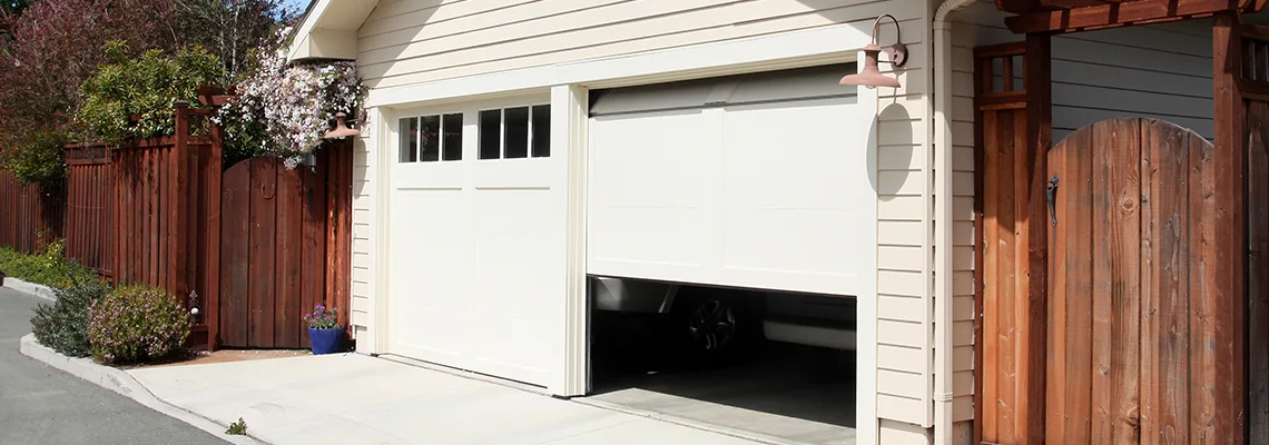 Fix Metal Garage Door Jerking in Palm Bay, Florida